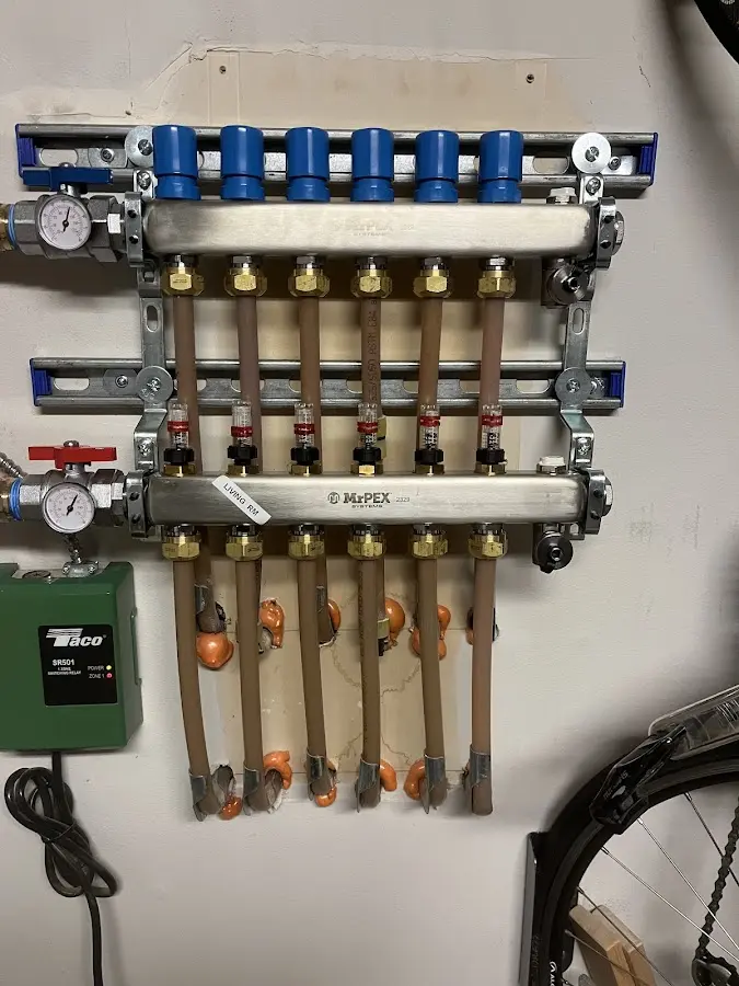 Plumber performing Gas Line Installation at a residential property in Wayland